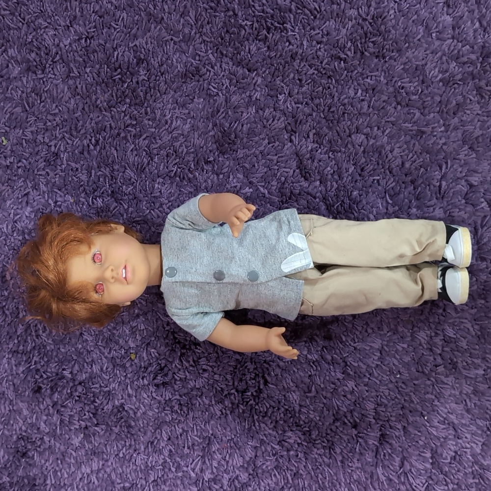 Vintage Lotus Boy doll with Crazy color eyes